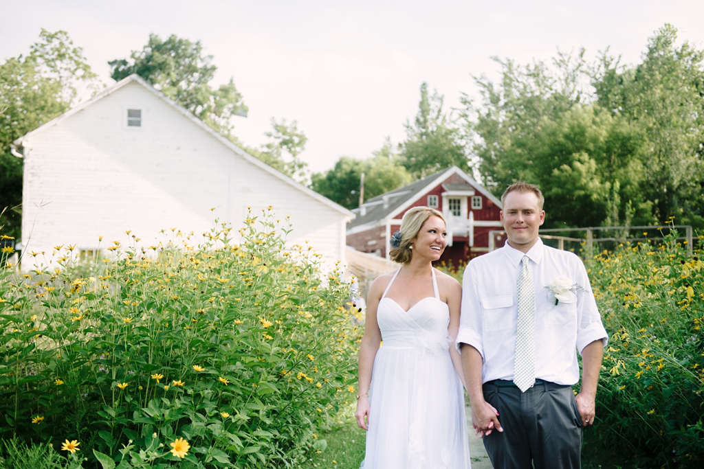 Candid Portraits of the couple outside of Gibbs Farm in their Summer Wedding Minnesota