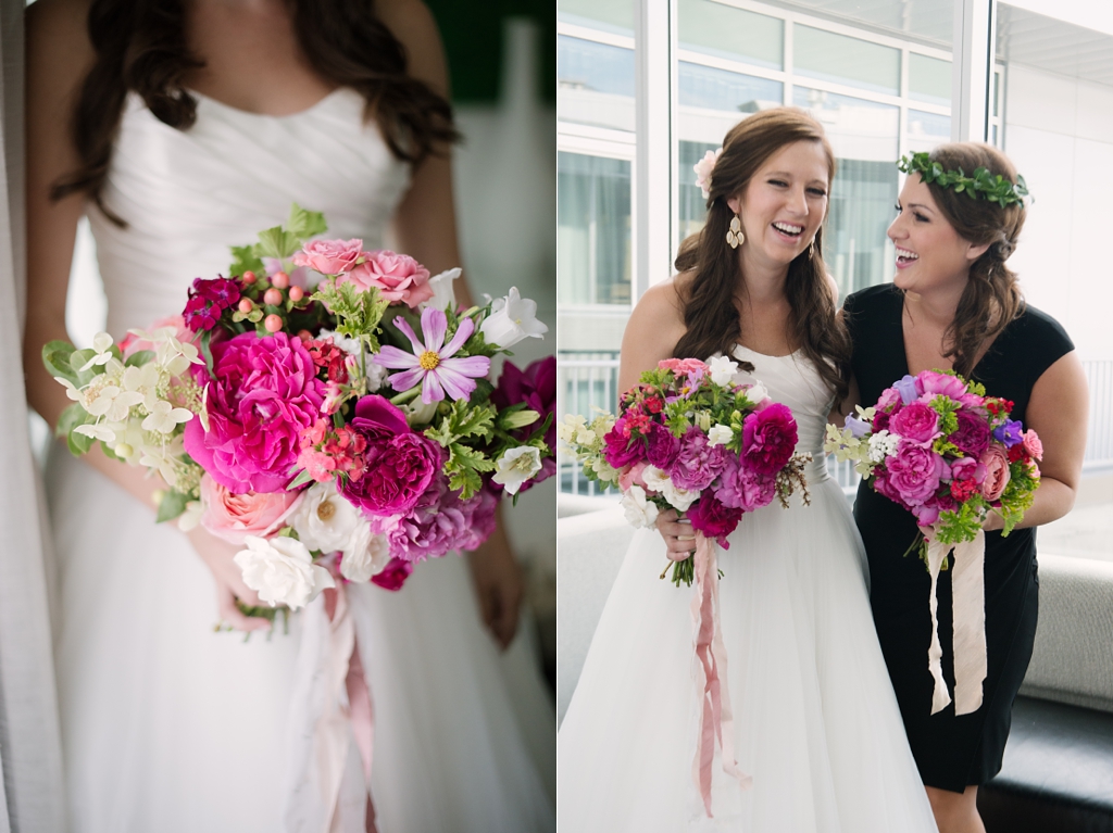 bride and bridesmaid with bright pink bouquets
