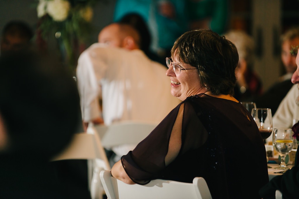 guests listen to speeches at wisconsin wedding reception