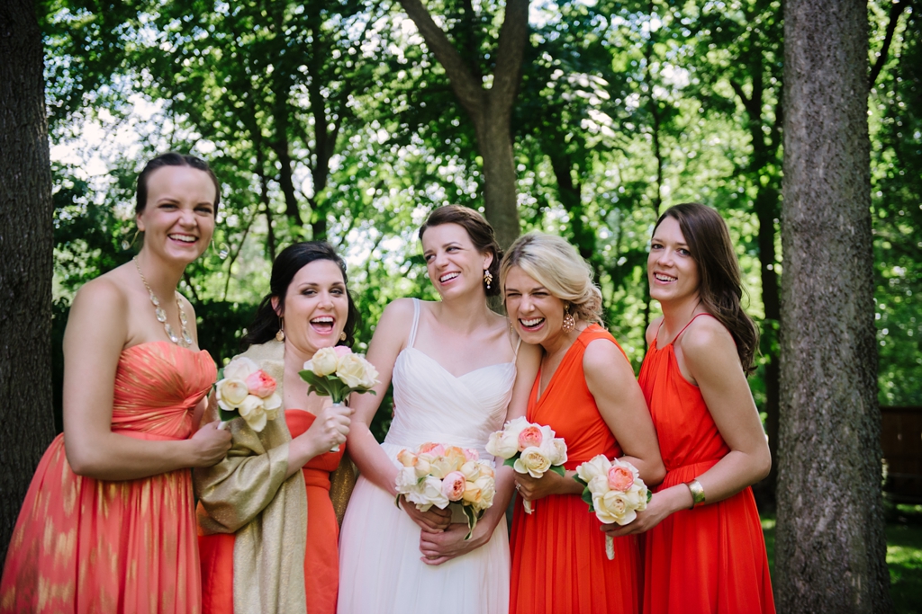 bridal party laughing together