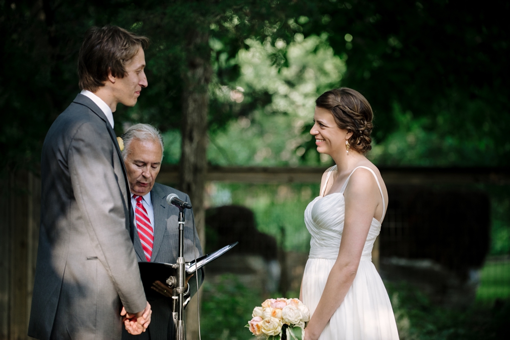 iowa backyard wedding exchanging vows
