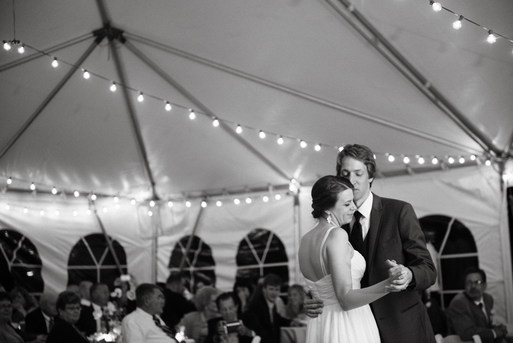 bride and groom share first dance at backyard wedding
