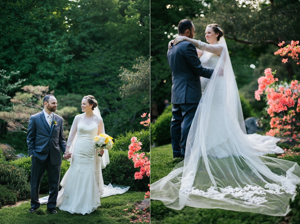 bride and groom walk together through arboretum