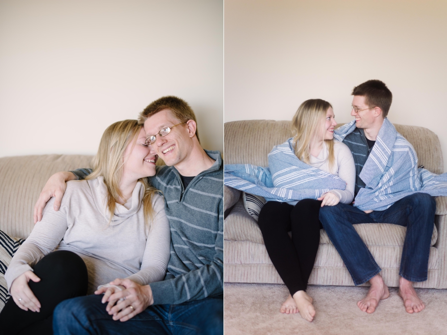 couple embracing on sofa during twin cities session