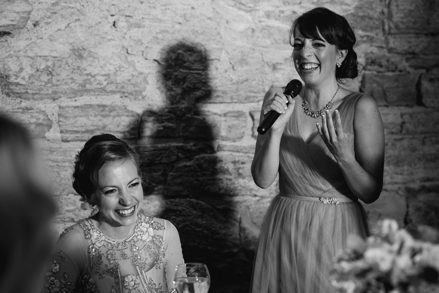 bridesmaid giving toast at minnesota wedding reception