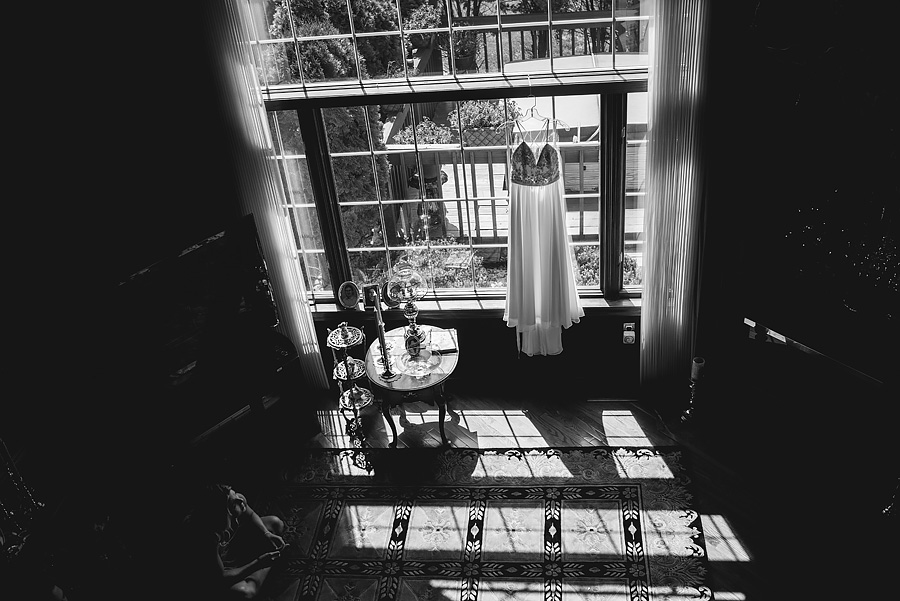 black and white dress photo hanging in the window