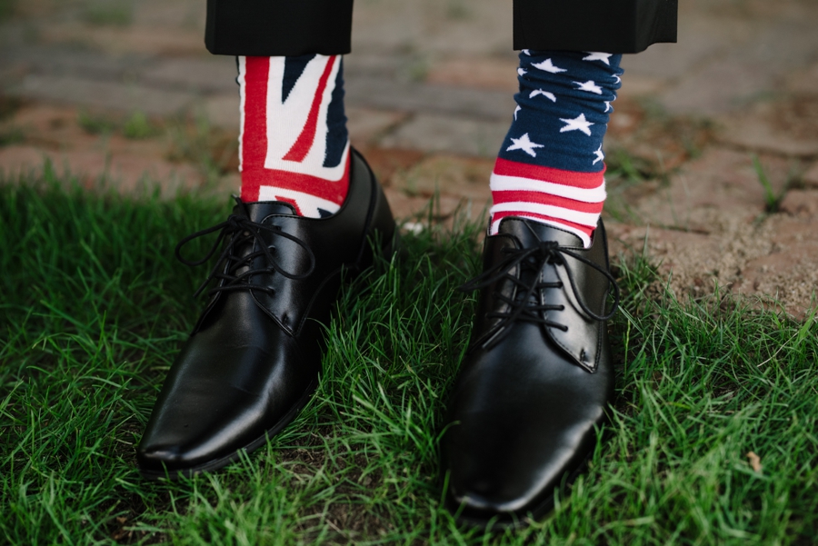 detail photo of groom wearing UK and US socks