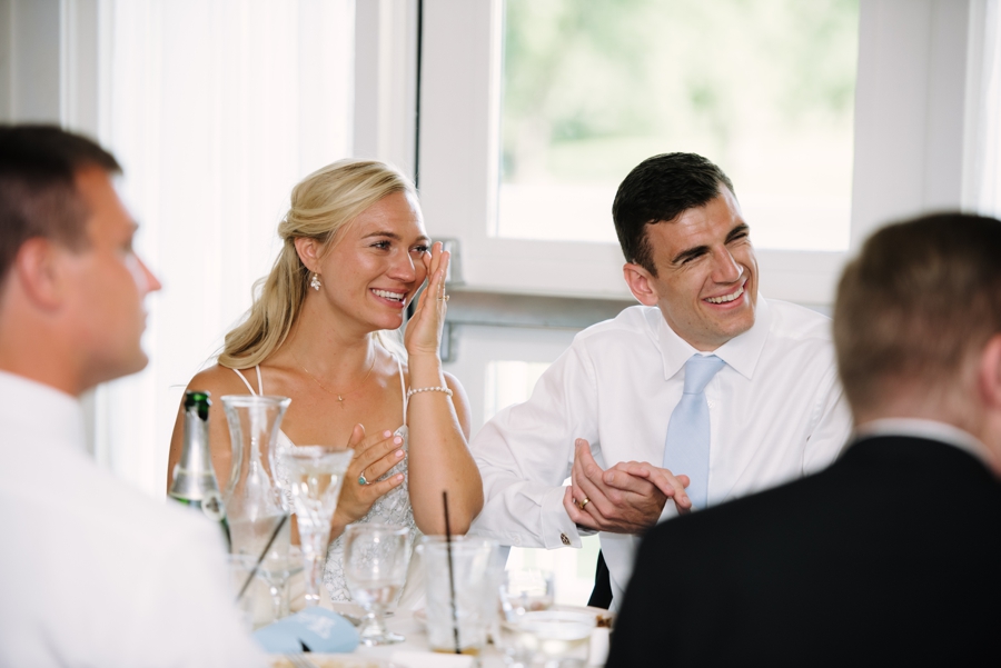 bride and groom reaction during speeches