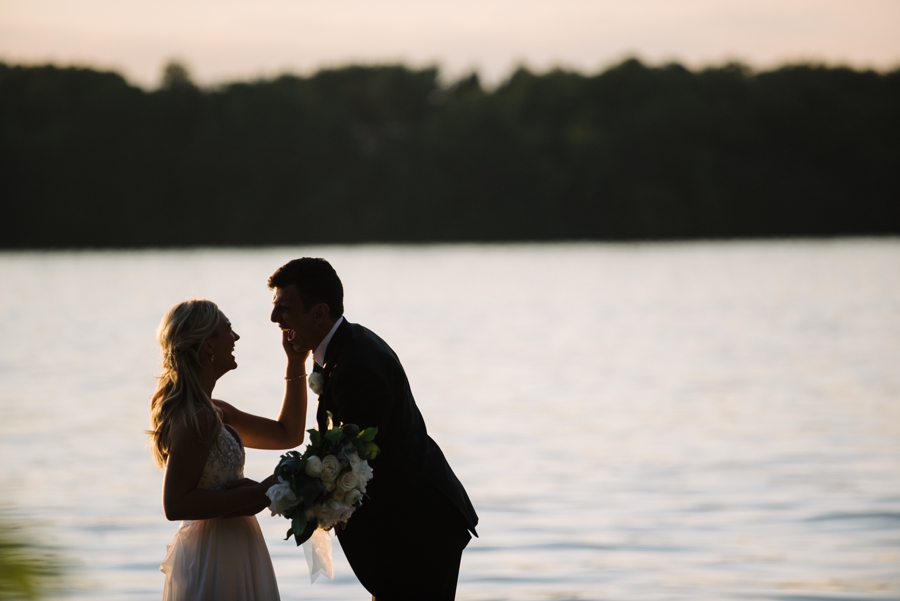 wedding couple sunset portraits by the lake