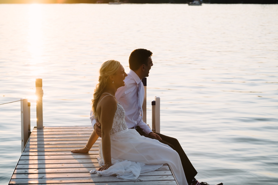 wedding couple sunset portraits by the lake