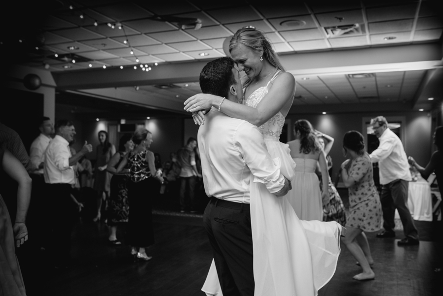 bride and groom dancing during reception 