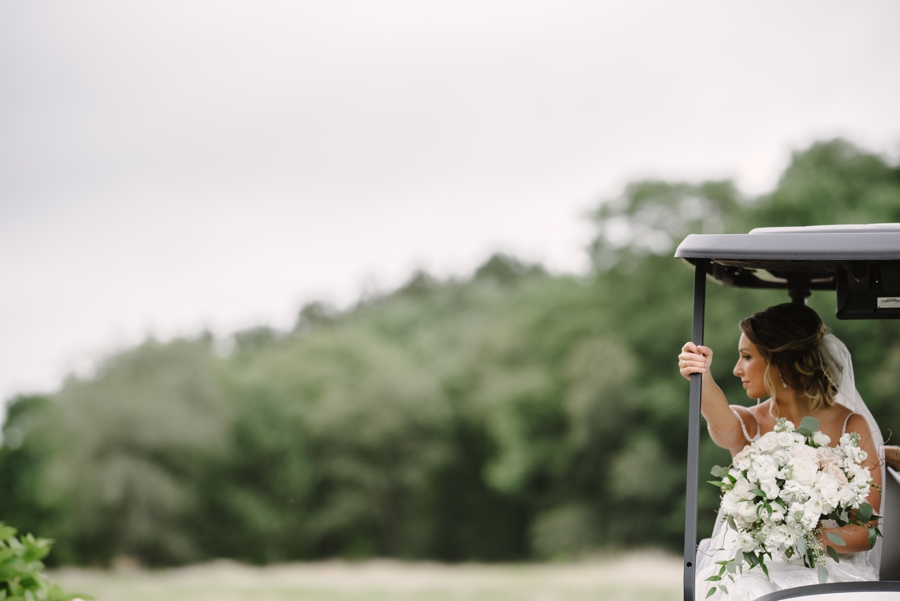 bride riding in golf cart at saint croix national wisconsin