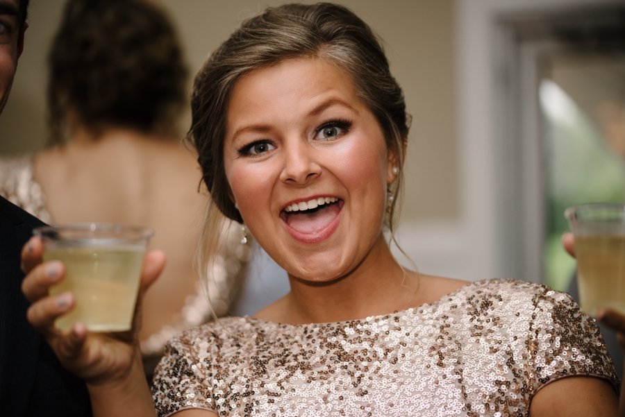 bridemaid smiling during cocktail hour