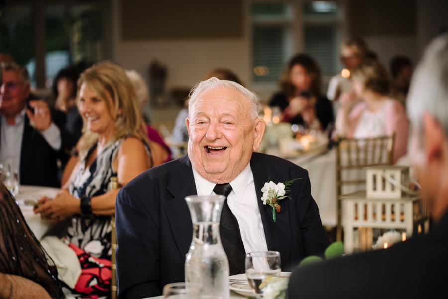 grandparent laughing at reception