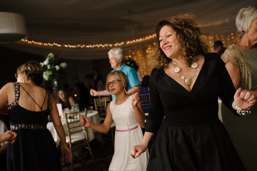 guests dancing at reception 