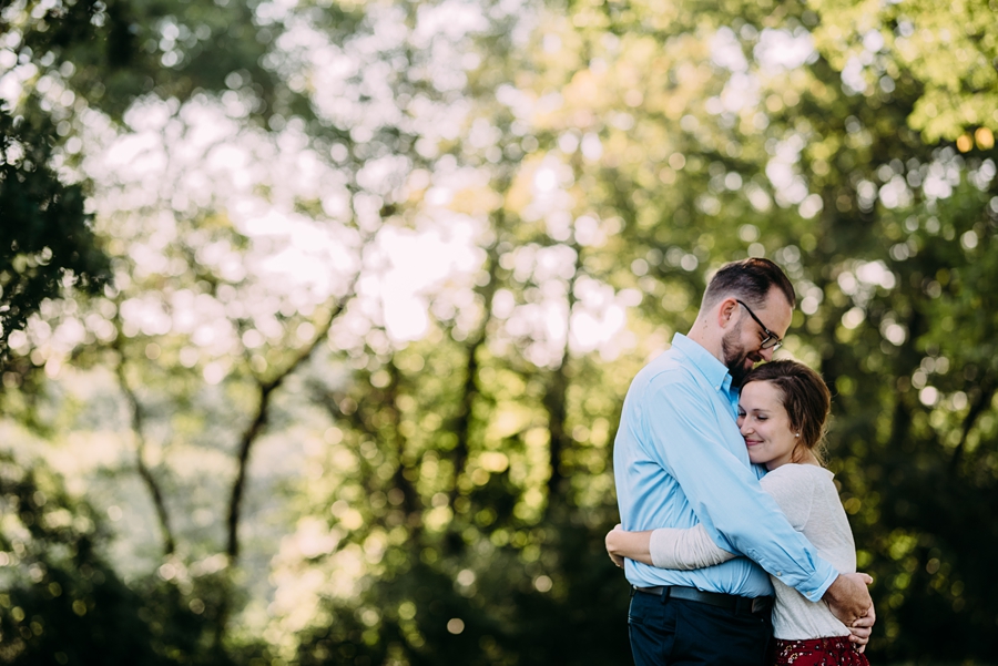 couple session hugging during their engagement session in Minnesota