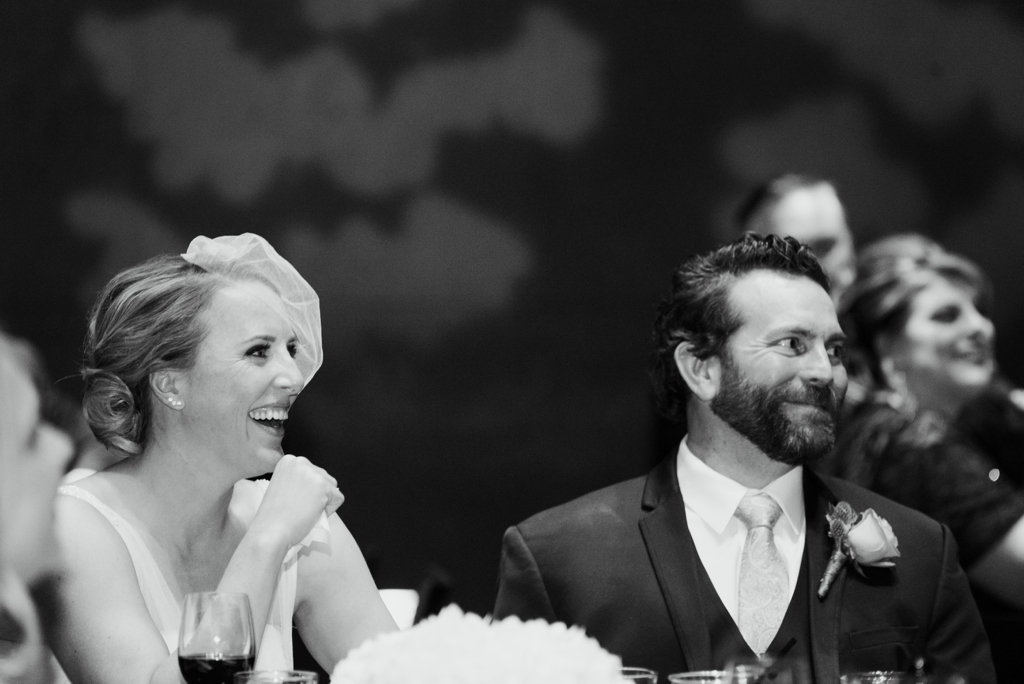 Bride and groom happy reactions during Minneapolis Wedding Reception