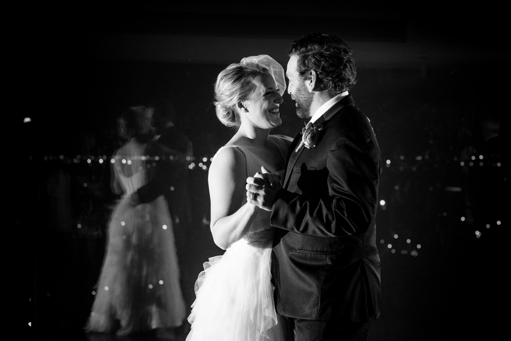 Minneapolis first dance with city lights in the background