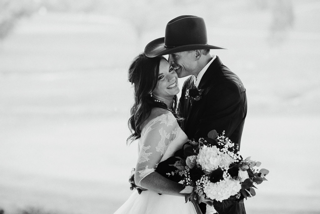 bride and groom portrait during western style wedding in Minnesota