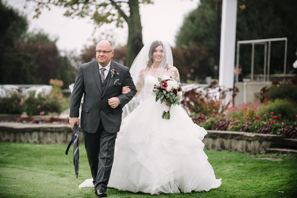 Father walking bride during Minnesota outdoor golf course wedding