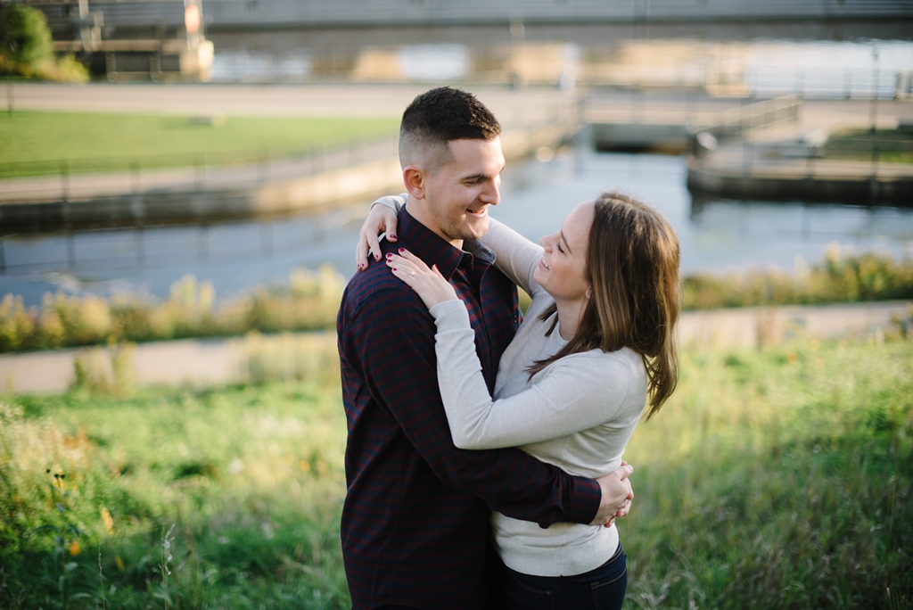 laughing couple engagement session downtown minneapolis minnesota