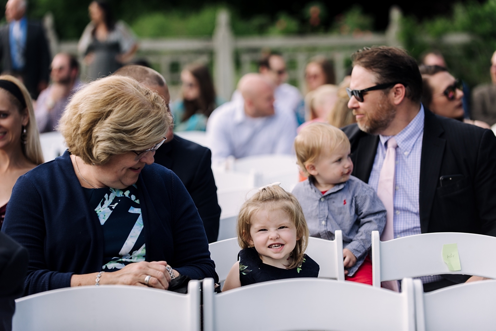 smiling guests at outdoor minnesota wedding