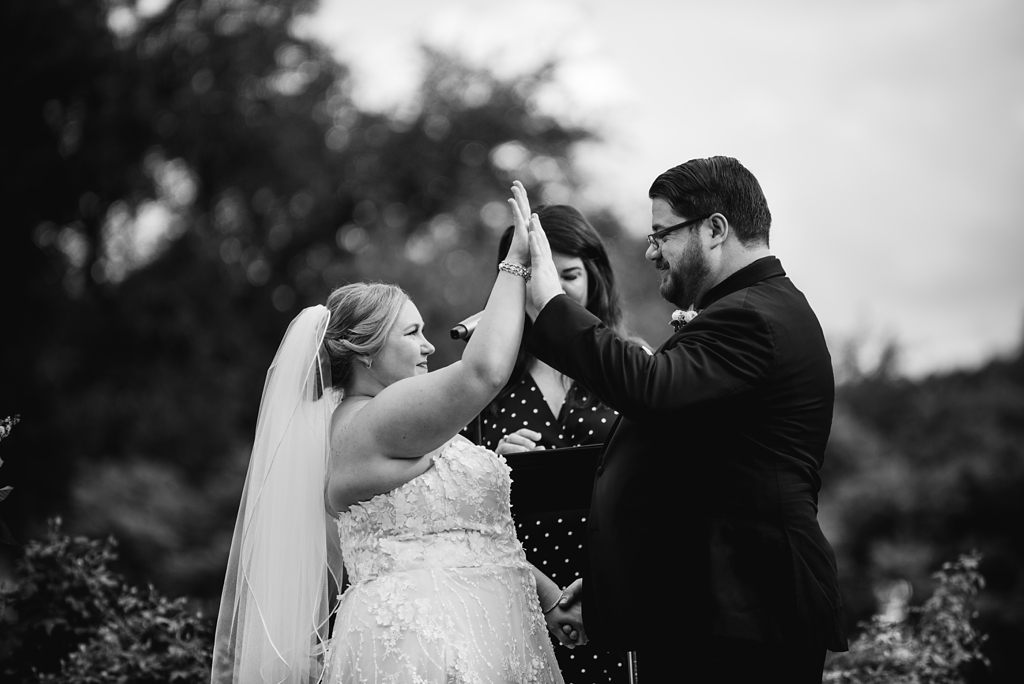 bride and groom high five