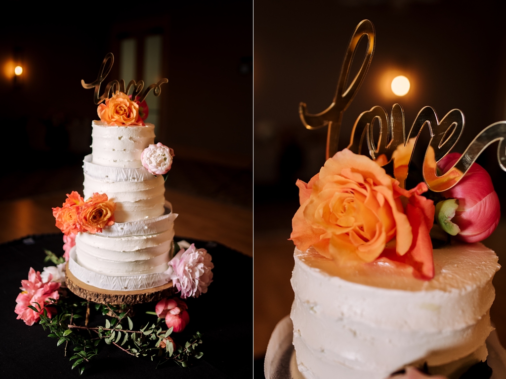 rustic wedding cake with orange and pink flowers