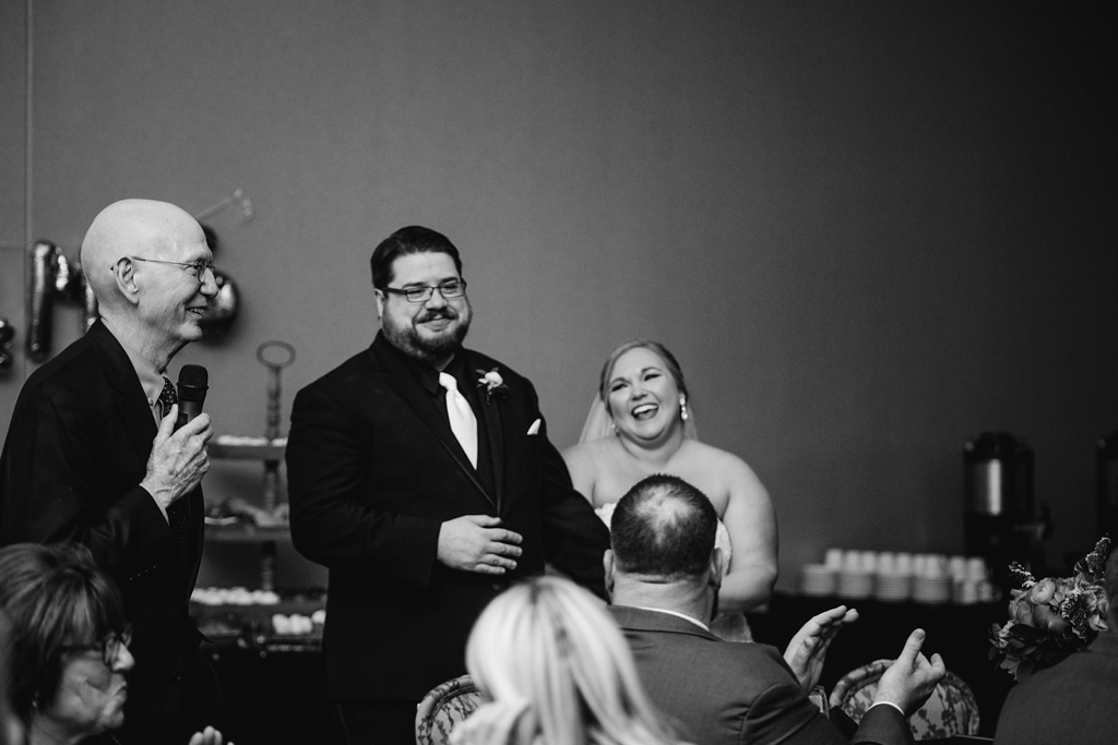 black and white image of speeches at minnesota wedding