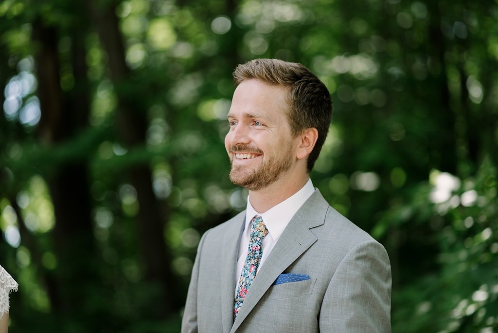 outdoor groom portrait with colorful tie