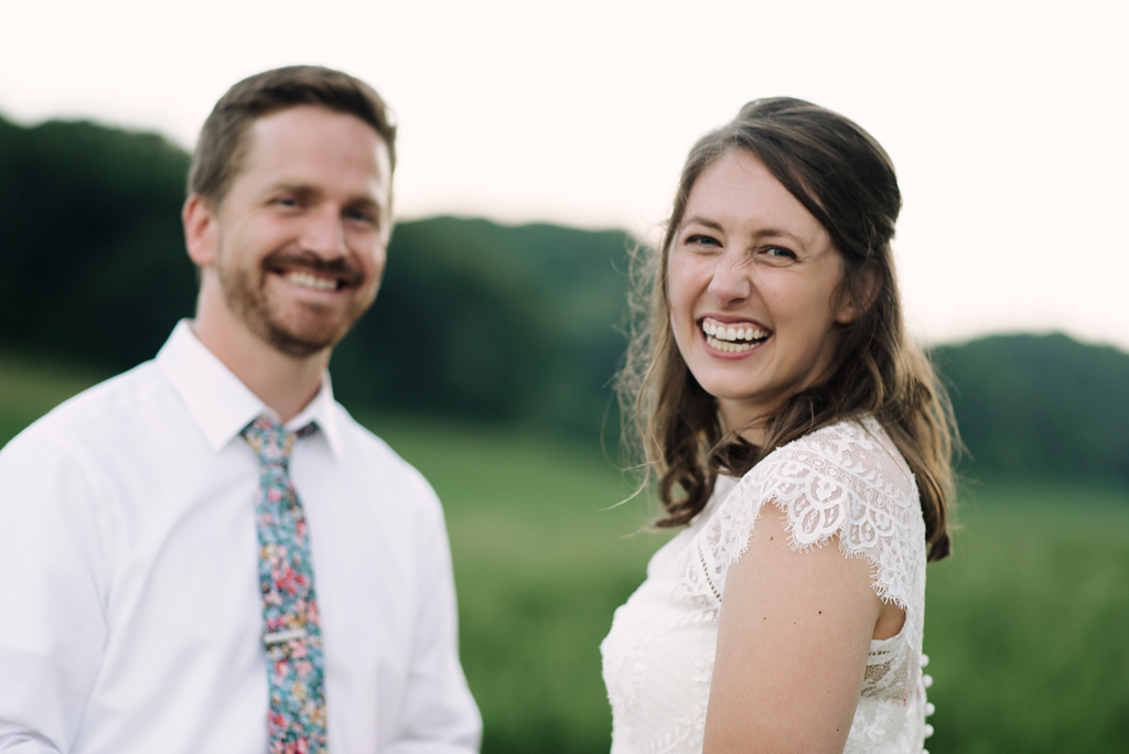 married couple laughing after wisconsin barn wedding