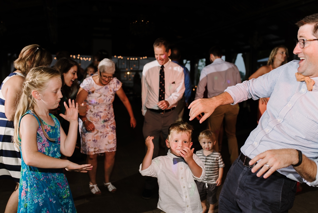 wisconsin farm wedding guests dance at reception