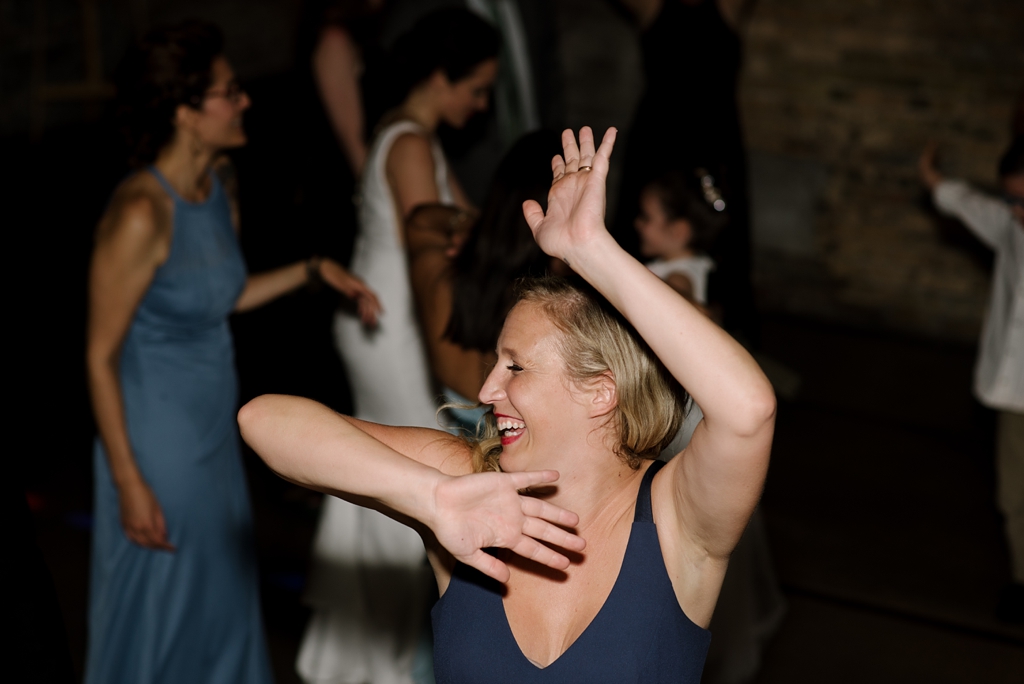 bridesmaid dancing at minneapolis wedding reception