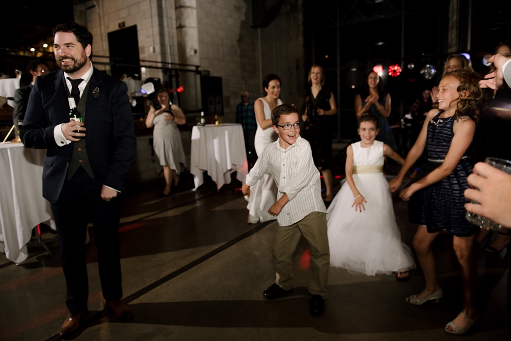 groom and kids dance at minneapolis wedding reception