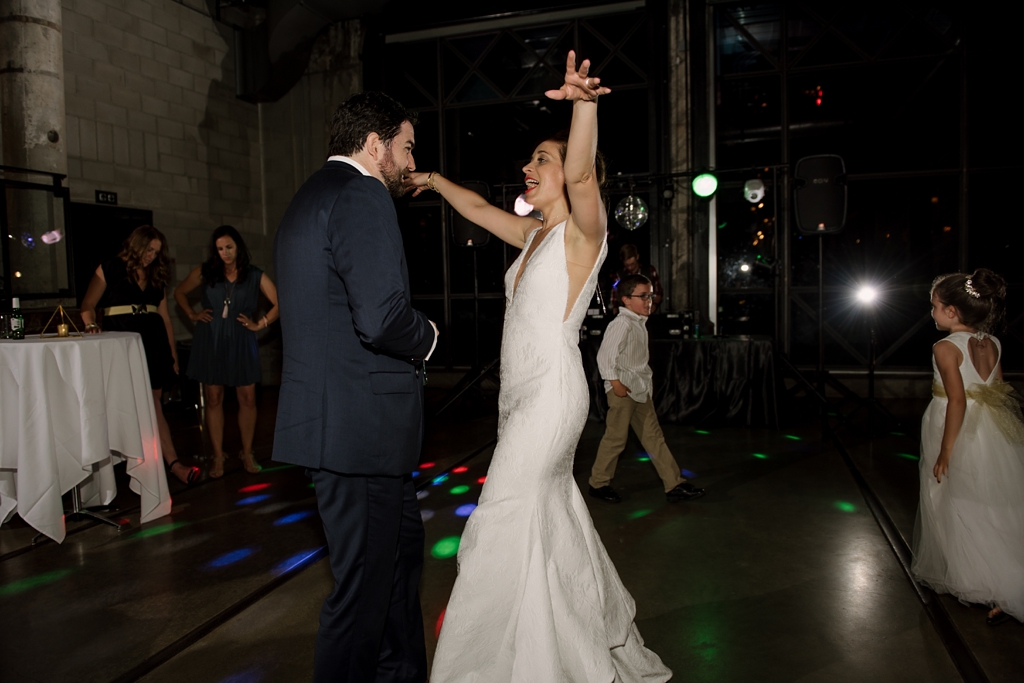 newlyweds dance at mill city museum wedding reception