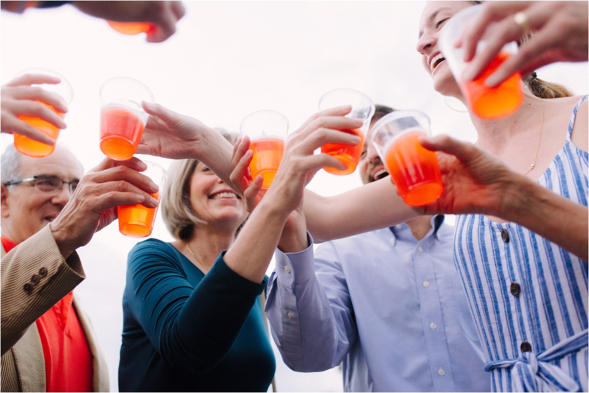 family toasting new engagement