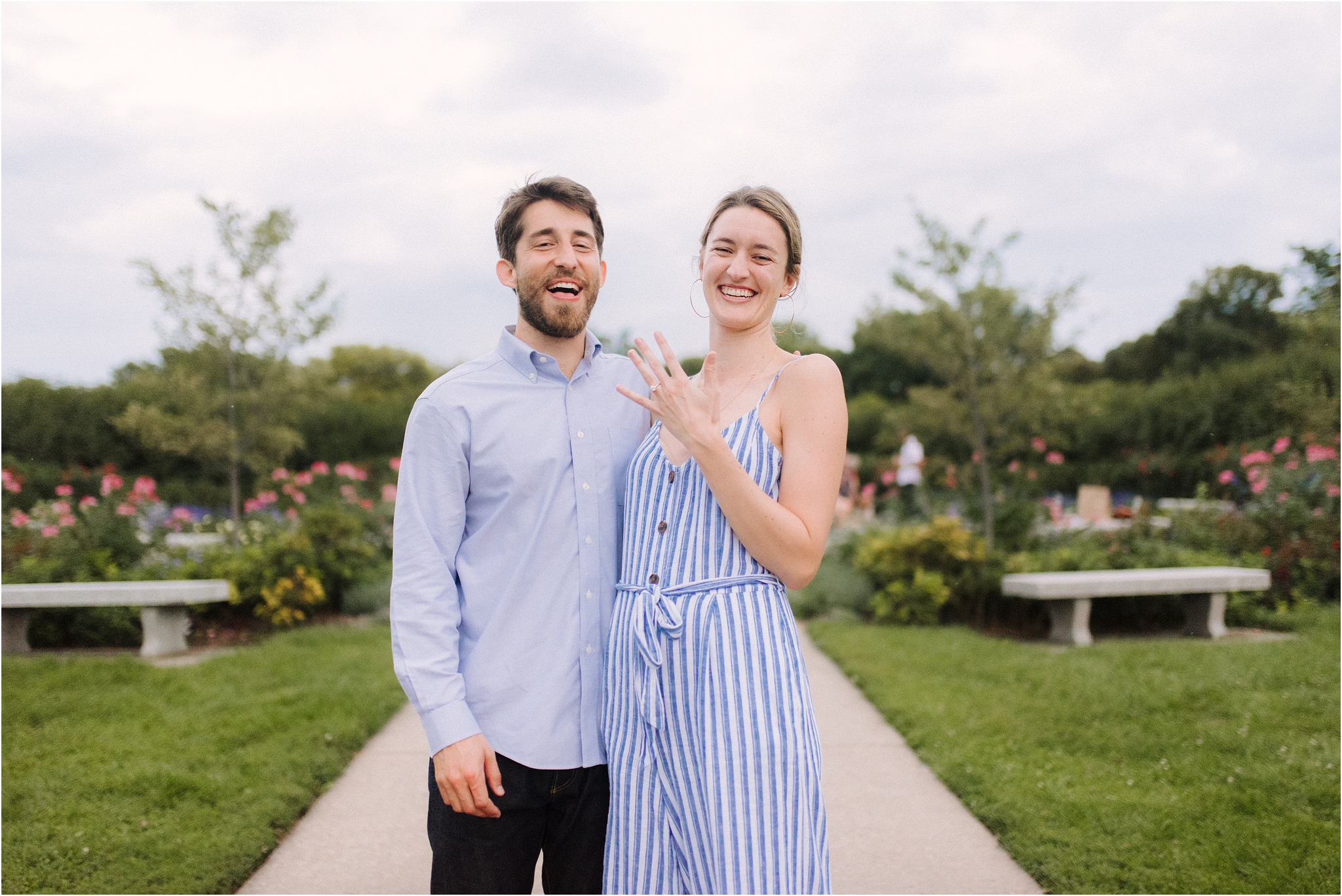 newly engaged couple showing off ring