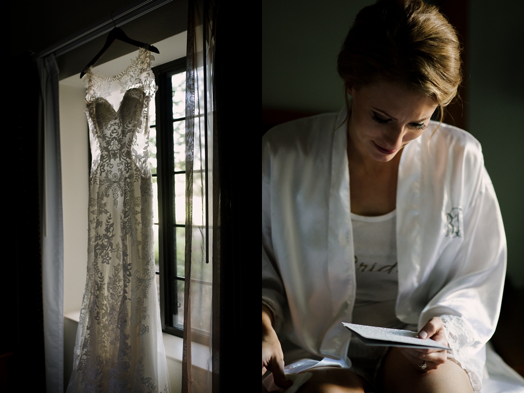 bride reading letter and wedding dress hanging in window