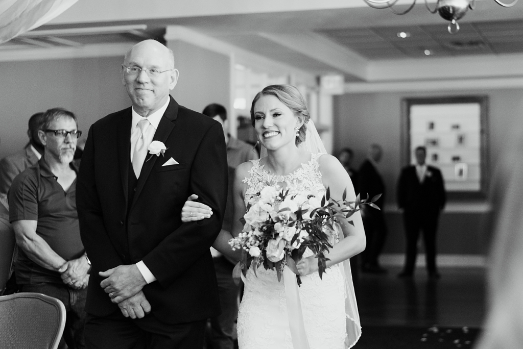 father walks bride down aisle