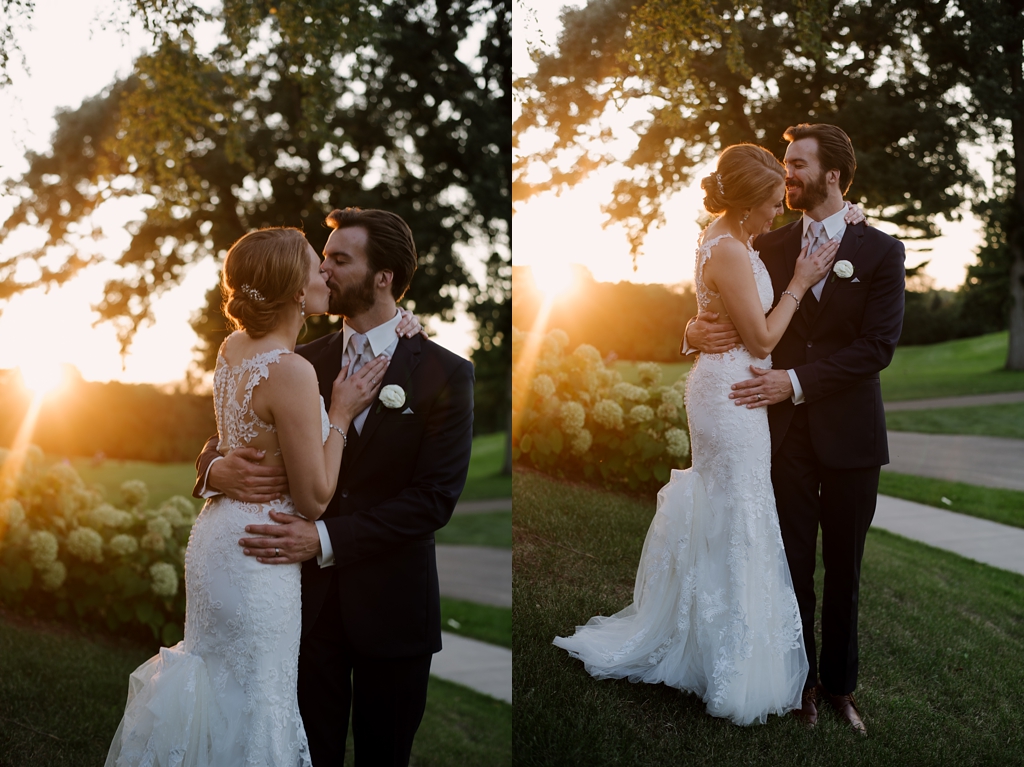 newlyweds kiss in sunset image