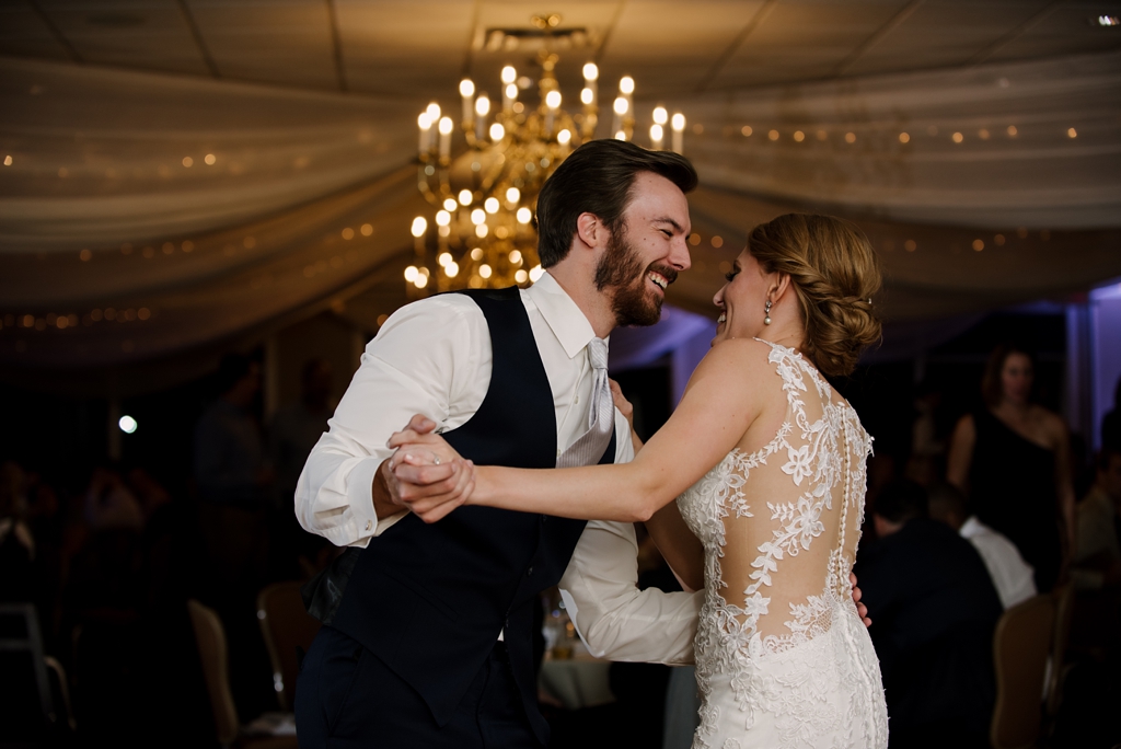 newlyweds laugh during first dance