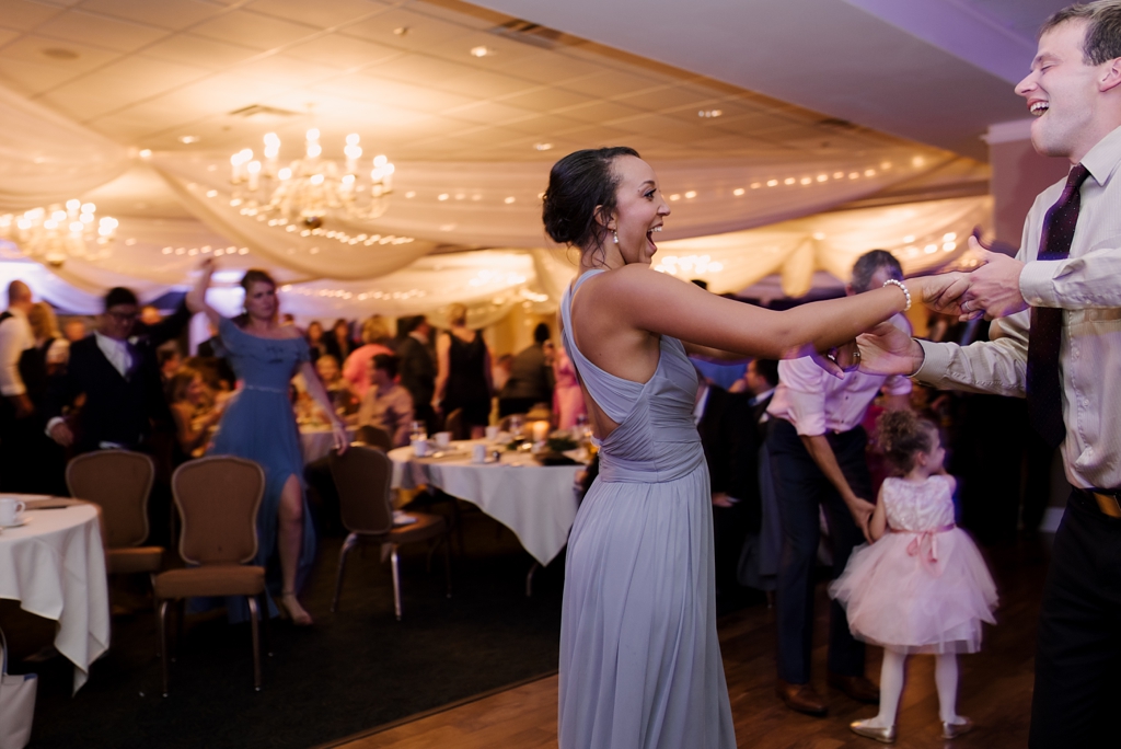 wedding guests dance at country club reception