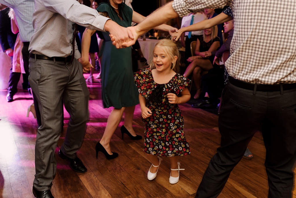 wedding guests dance at reception