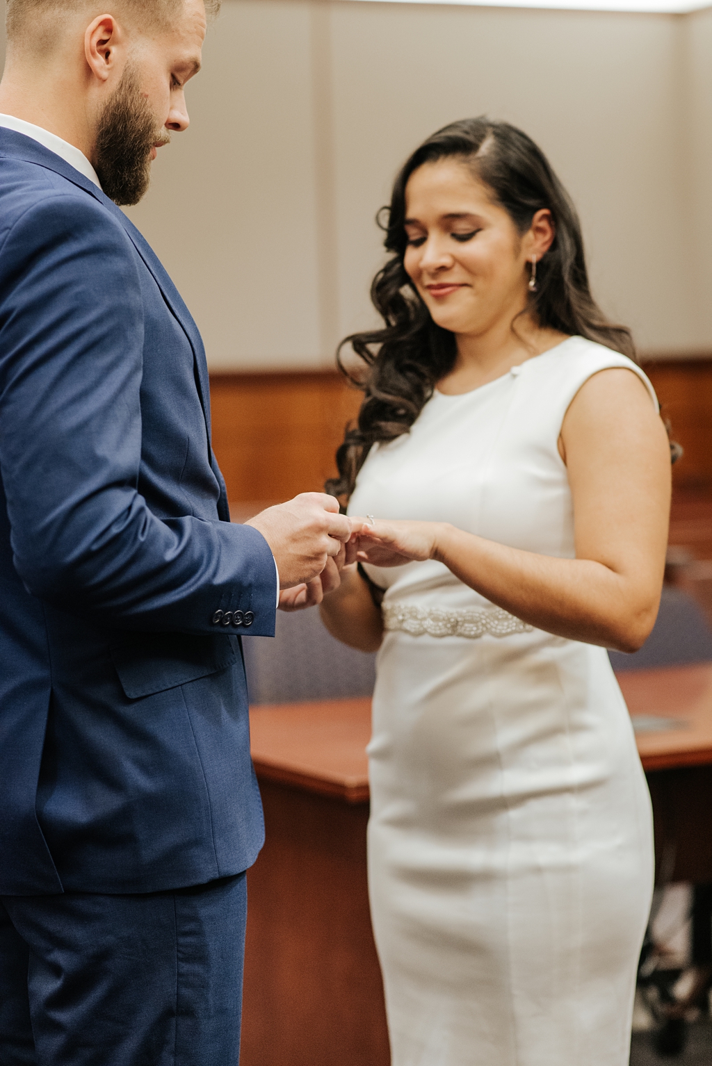 city hall bride and groom exchange rings