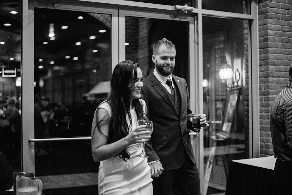 bride and groom toast at wedding reception