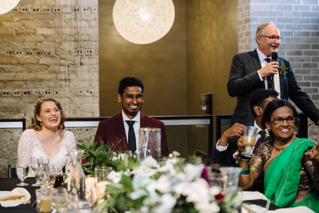 father of the bride toasts at wedding reception