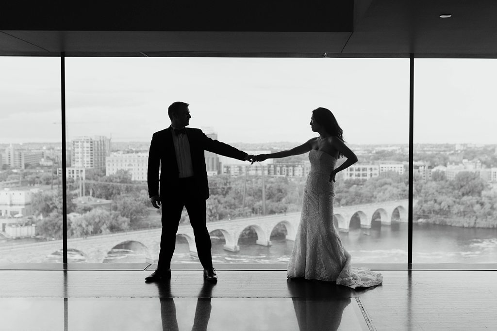 bride and groom inside guthrie theater downtown minneapolis minnesota
