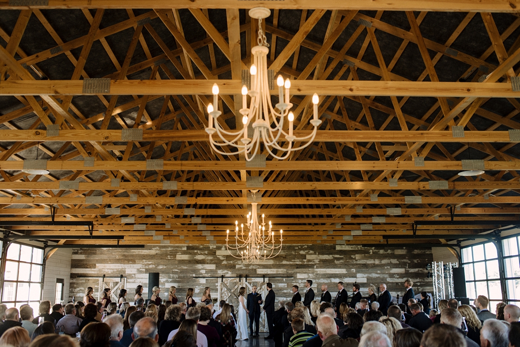 serenity hills wedding venue with open ceiling and chandeliers