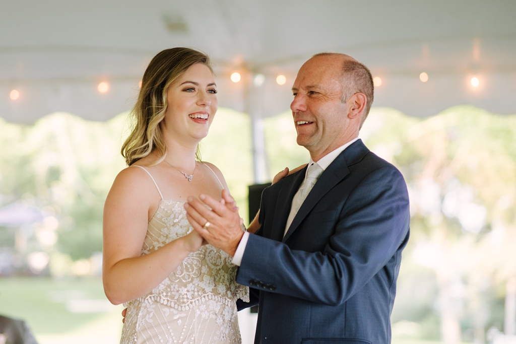 bride and father dance at backyard wedding reception