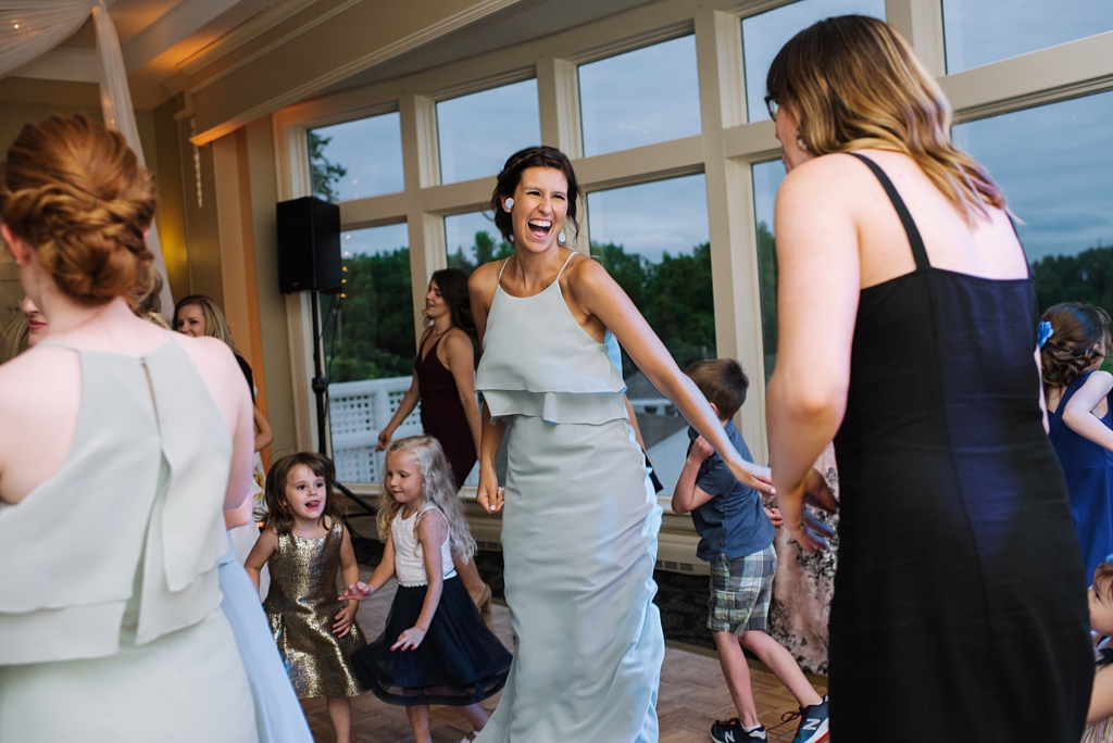 wedding guests enjoy reception at minneapolis golf club